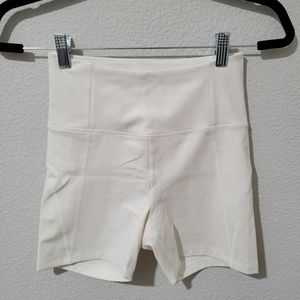 Girlfriend Collective High Rise Bike Shorts in Ivory
